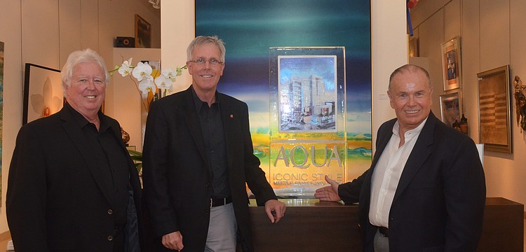 Developer Michael Adams, architect Guy Peterson and developer Jonathan McCague present the new luxury condominiums.