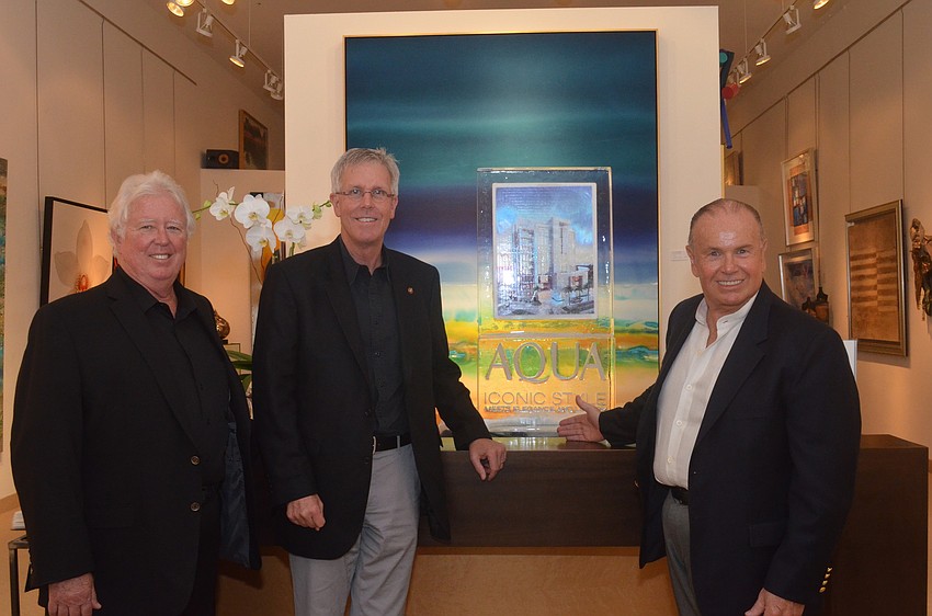 Developer Michael Adams, architect Guy Peterson and developer Jonathan McCague present the new luxury condominiums.