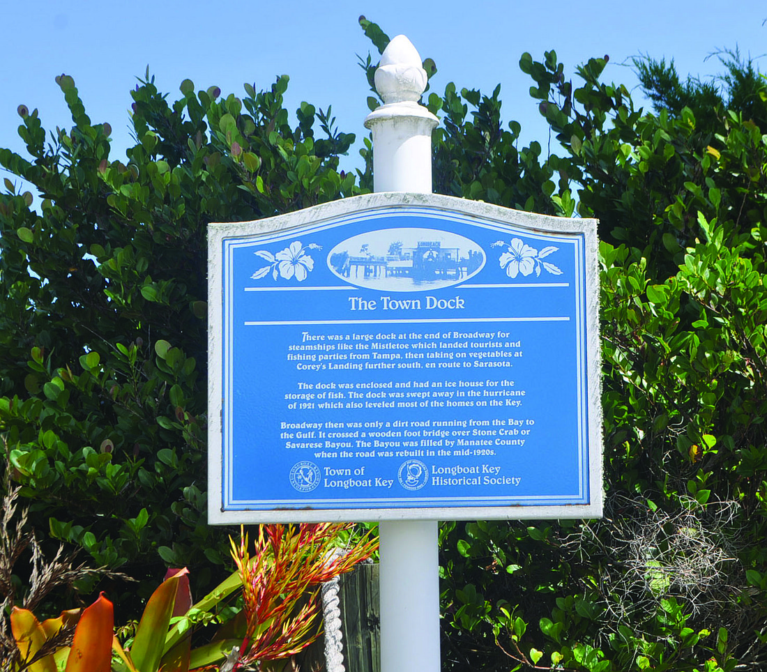 A historic marker on Broadway commemorates the old town dock that was destroyed in a 1921 hurricane.