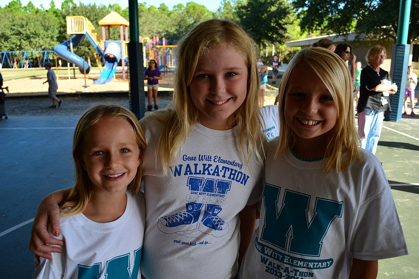 Marissa Veith, Ilona Van Sprundel and Lexi Bruneman were eager to see their teacher get wet in the dunk tank.