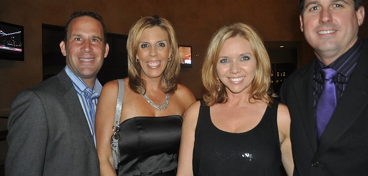 Tim and Lisa Holler with Melissa and Matt Rixon; Melissa Rixon is co-vice president of the McNeal Parent Teacher Organization.