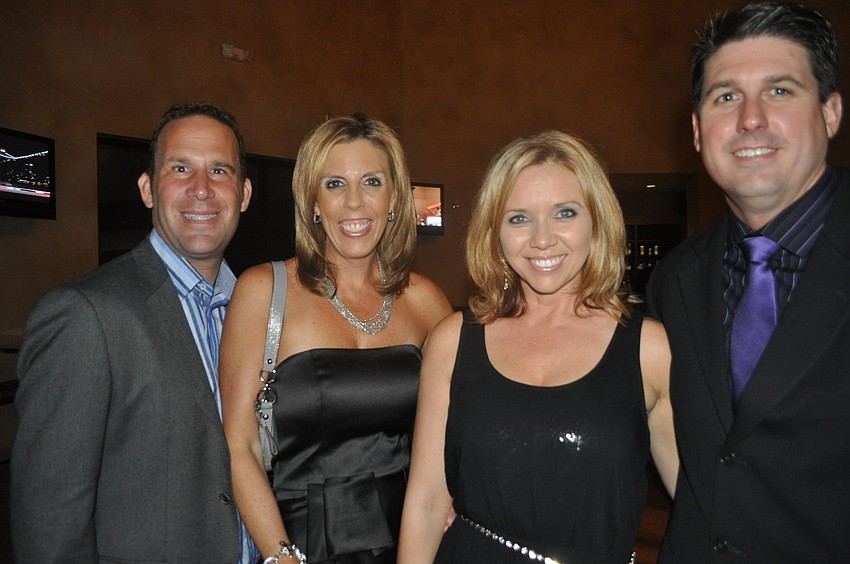 Tim and Lisa Holler with Melissa and Matt Rixon; Melissa Rixon is co-vice president of the McNeal Parent Teacher Organization.