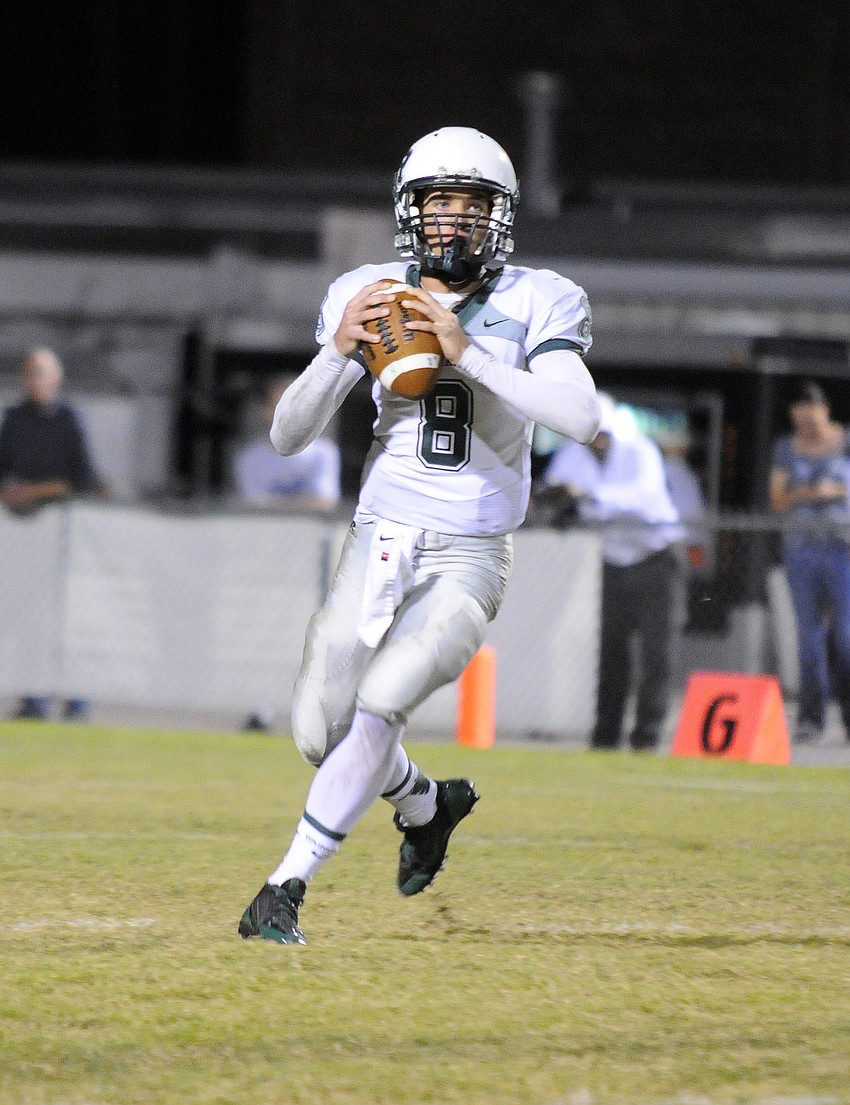 Lakewood Ranch quarterback Chad Rex drops back to pass in the second quarter.