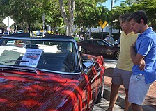 Ron and John Gricius check out the 1970 Mercedes Benz 280 SL