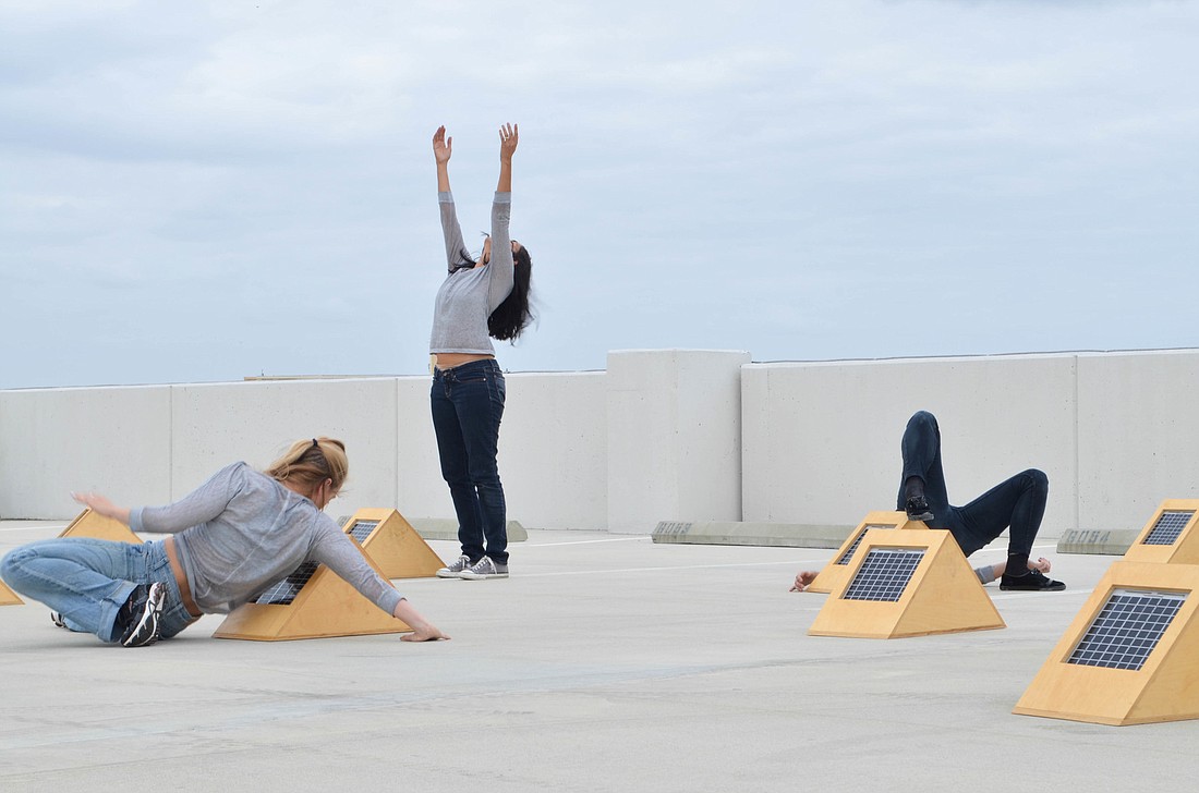 FuziÃƒÂ³n Dance Artists perform on the top level of the Palm Ave. Garage Monday evening.