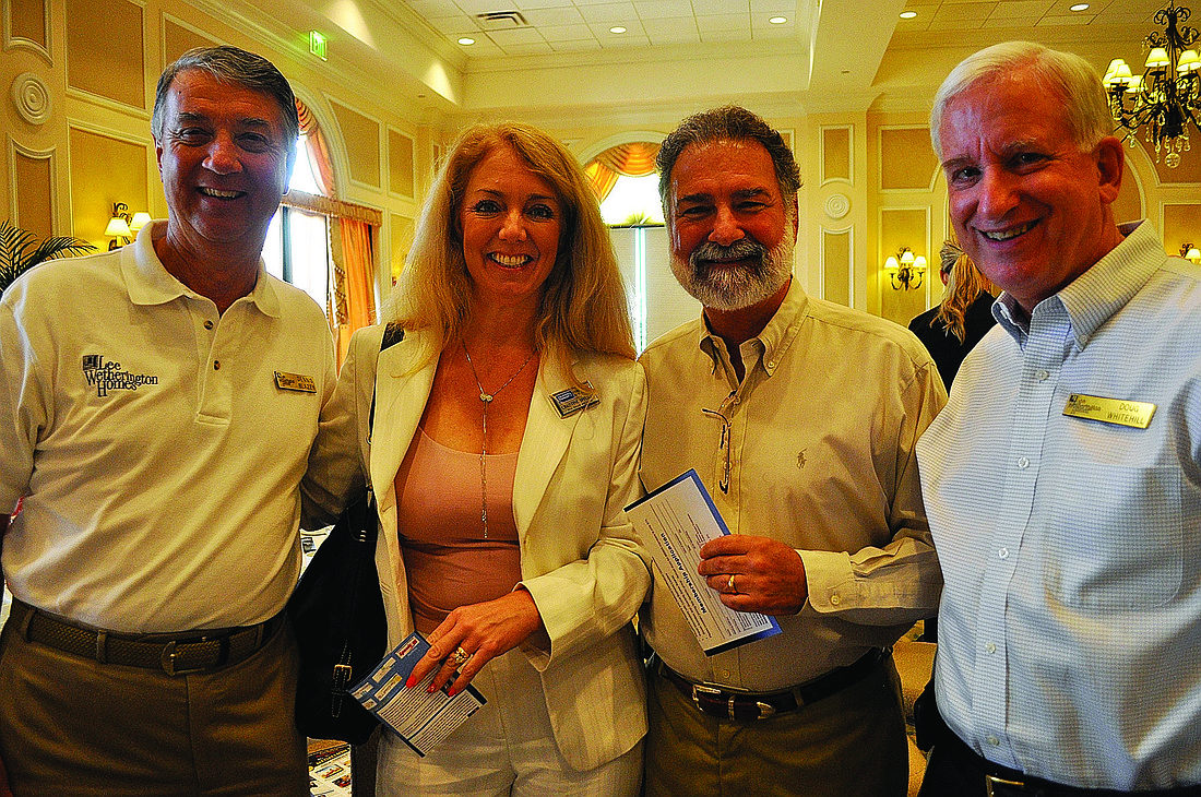 Dennis Blazey, of Lee Wetherington; Christine Spelman, of Coldwell Banker; and Peter Mason and Doug Whitehill, of Lee Wetherington