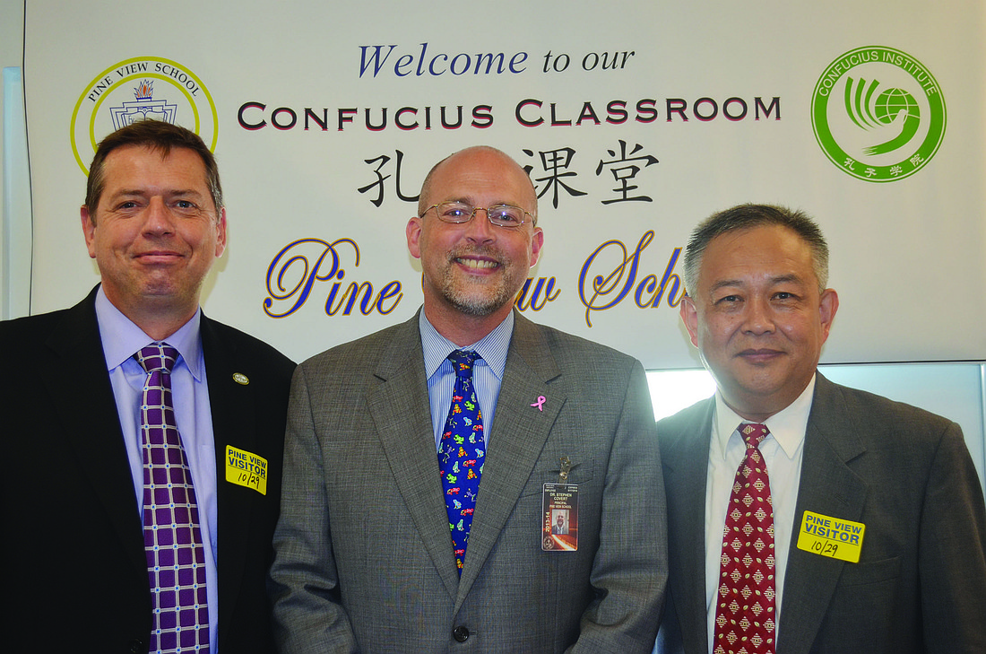 Dr. Roger Brindley, Principal Dr. Stephen Covert and Kun Shi