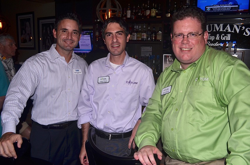 Gregory Pacitti, Callan Rivera and David Mercier enjoy food and drinks.