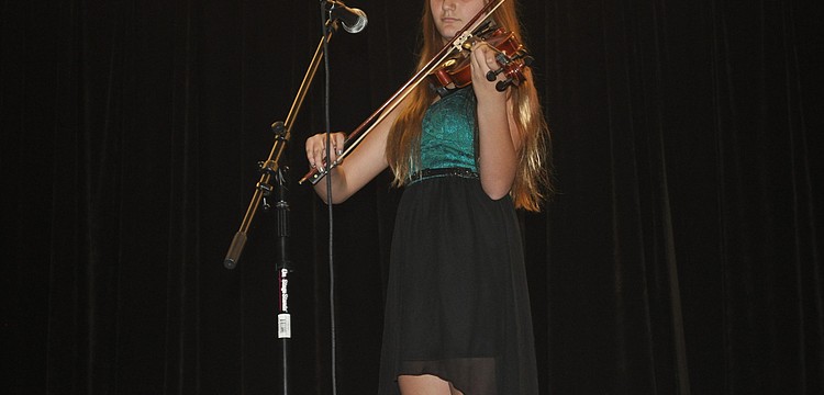 Allie Daniel, an eighth grader, played the violin.