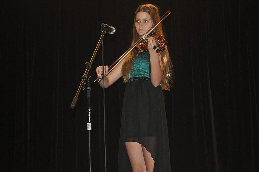 Allie Daniel, an eighth grader, played the violin.