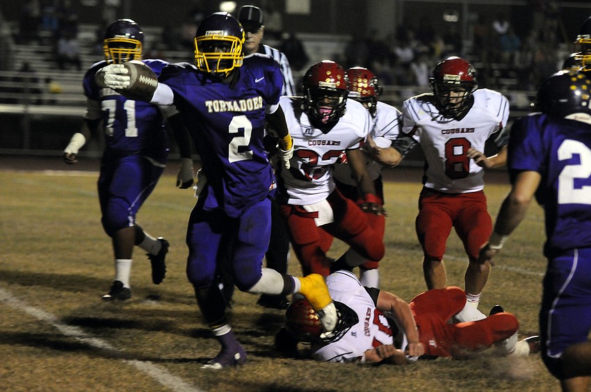 Booker running back Marlon Mack scored on runs of 6, 82, 24 and 85 yards to lead the Tornadoes to a 26-14 victory over Cardinal Mooney Nov. 8.