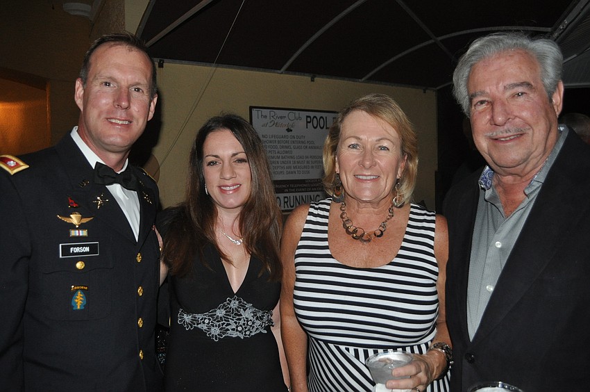 Mike Forson, who currently serves in the Army National Guard, with his wife, Angela, and Robyn and Howie Drourr of Michael Saunders & Company, an event sponsor