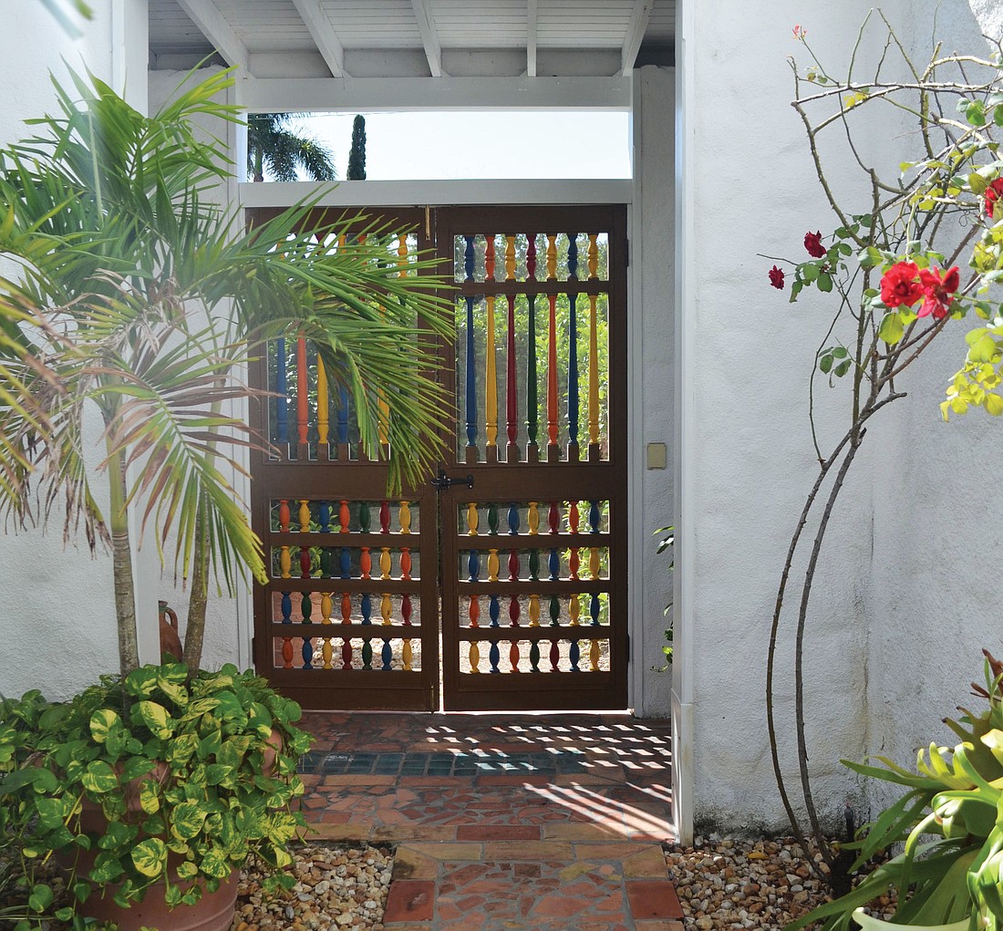 Wooden gates from John Ringling Towers add a colorful note of local history.