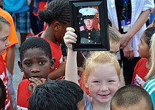 Six-year-old Abby Pollard supports her uncle who serves in the U.S. Marine Corps.