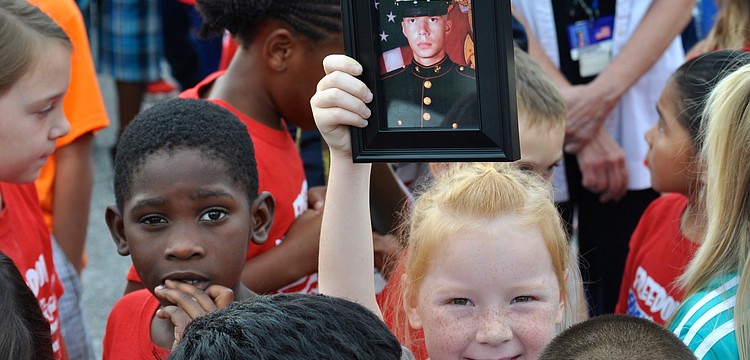 Six-year-old Abby Pollard supports her uncle who serves in the U.S. Marine Corps.