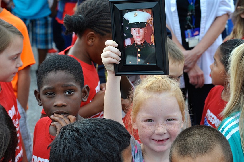 Six-year-old Abby Pollard supports her uncle who serves in the U.S. Marine Corps.