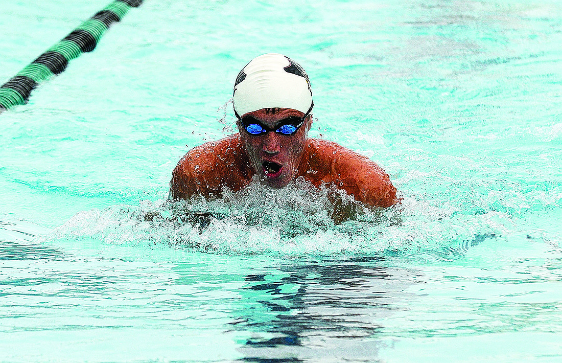 In his first season swimming with Braden River, sophomore Ryan Walker has won two district titles and a regional title.