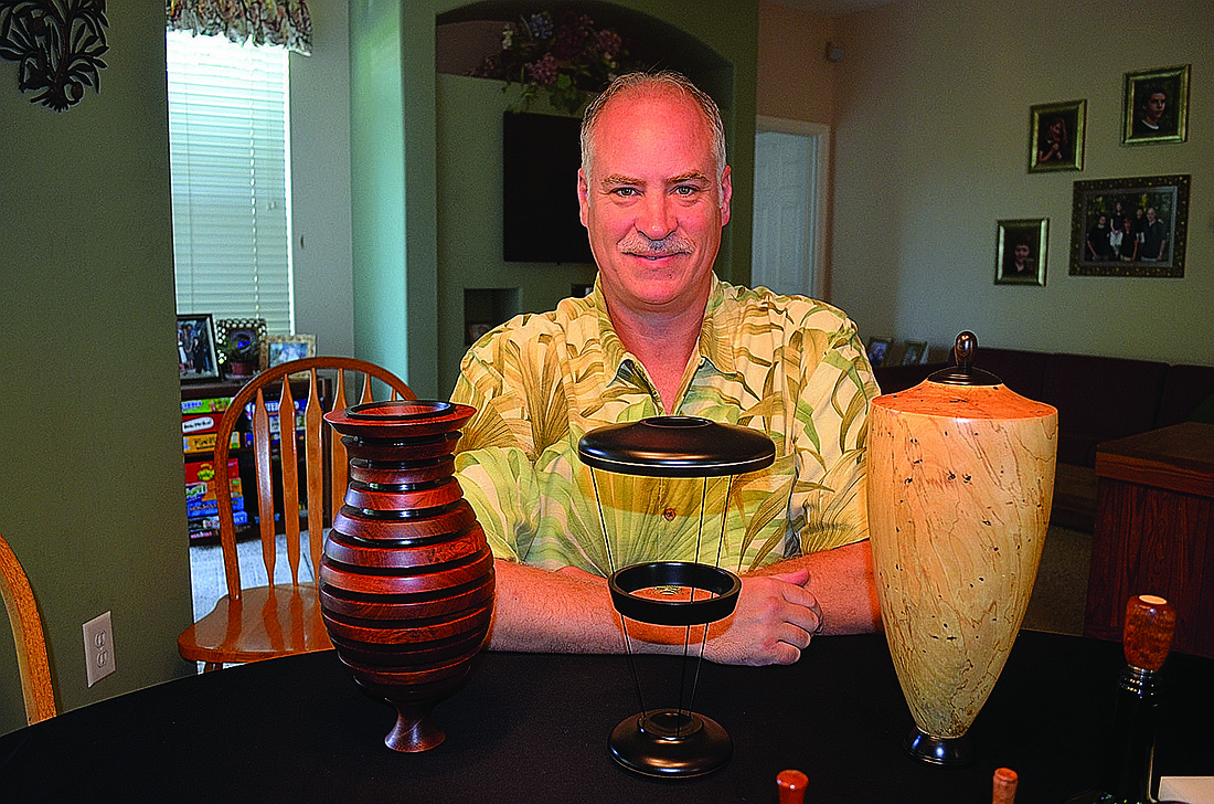 Jim OÃ¢â‚¬â„¢Donnell with three of his vases
