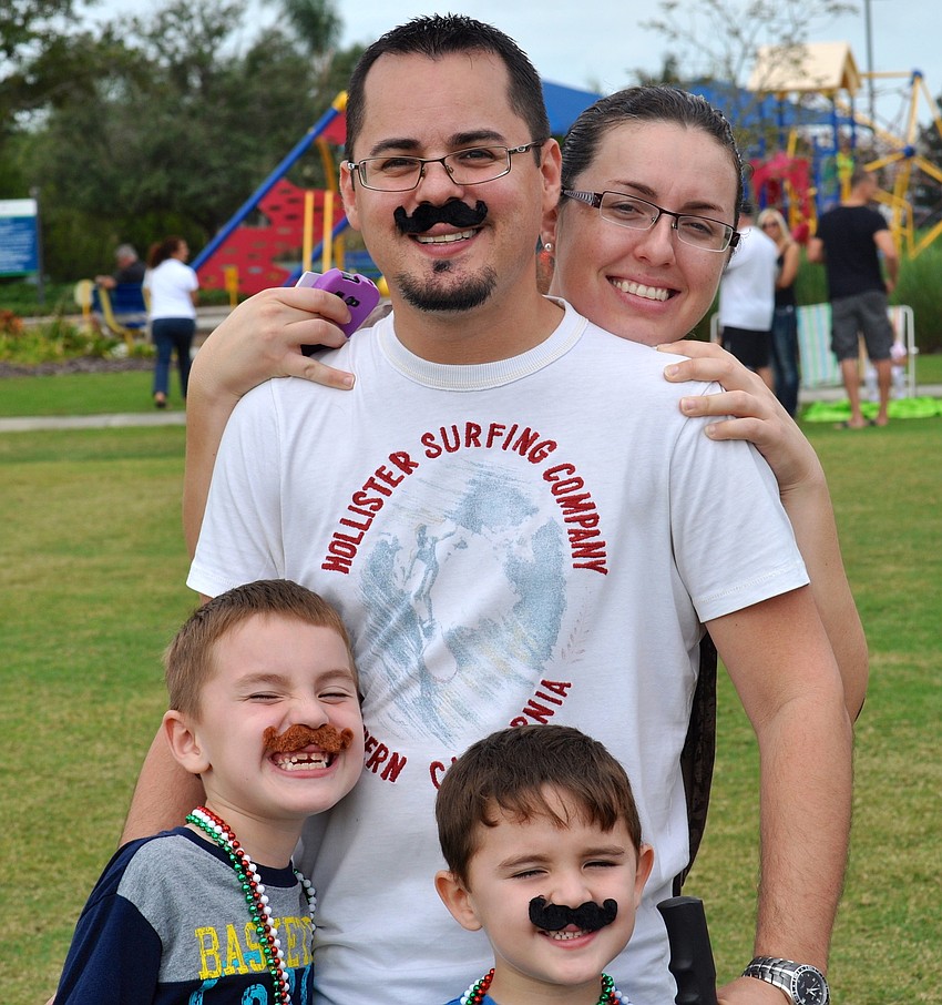 The Cuevas family â€” Elliott, 7, Caleb, 5, Edward and Nitza show their Italian pride.