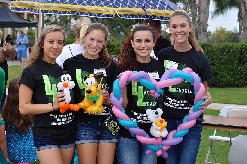 Fifteen-year-olds Sierra Amato, Sara Kelly, Angela Gennocro and Morgan Maggi show off balloon animals.