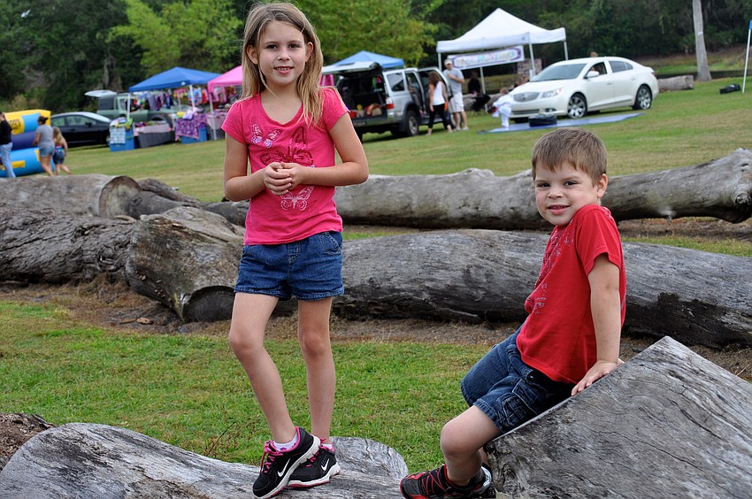 Brother-sister team, Bailey, 7, and Xavier, 4, Hughes, monkey around.