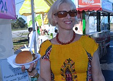 Cynthia Simpson starts her morning with a barbecue sandwich.