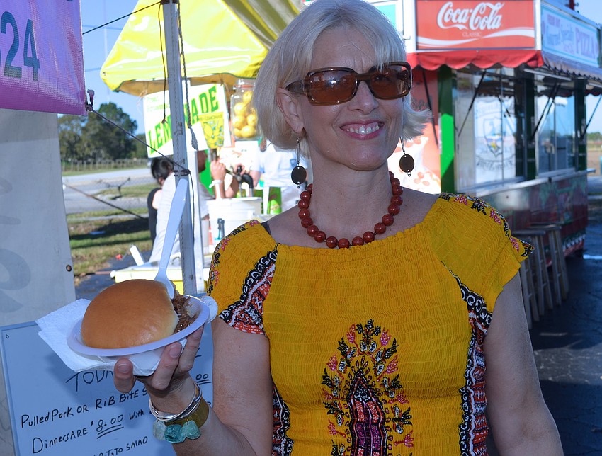 Cynthia Simpson starts her morning with a barbecue sandwich.