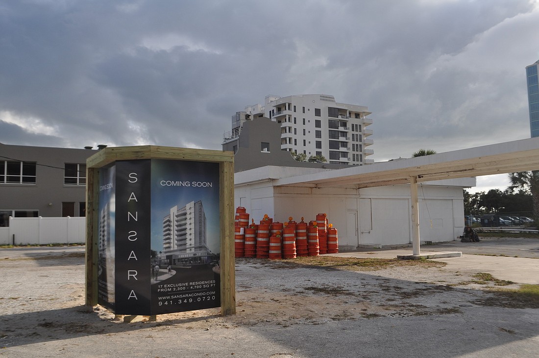 A 10-story condominium is planned for the site that currently houses an abandoned gas station.