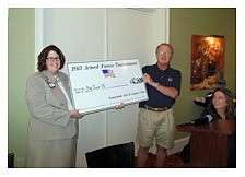 Courtesy photo. Mike Charles, SGCC, presented the check for $12,500 to Suzanne Klinker.