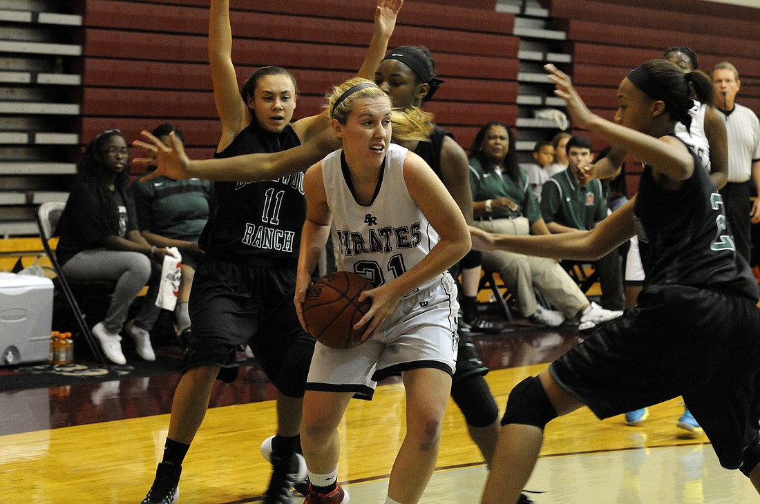 Braden River senior Kelly Logan is triple teamed by Lakewood Ranch in the first quarter.