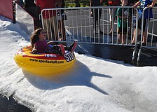 lexandra Keusch, 5, has fun sledding.