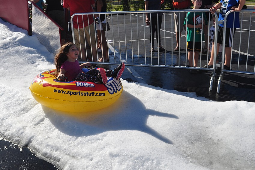 lexandra Keusch, 5, has fun sledding.