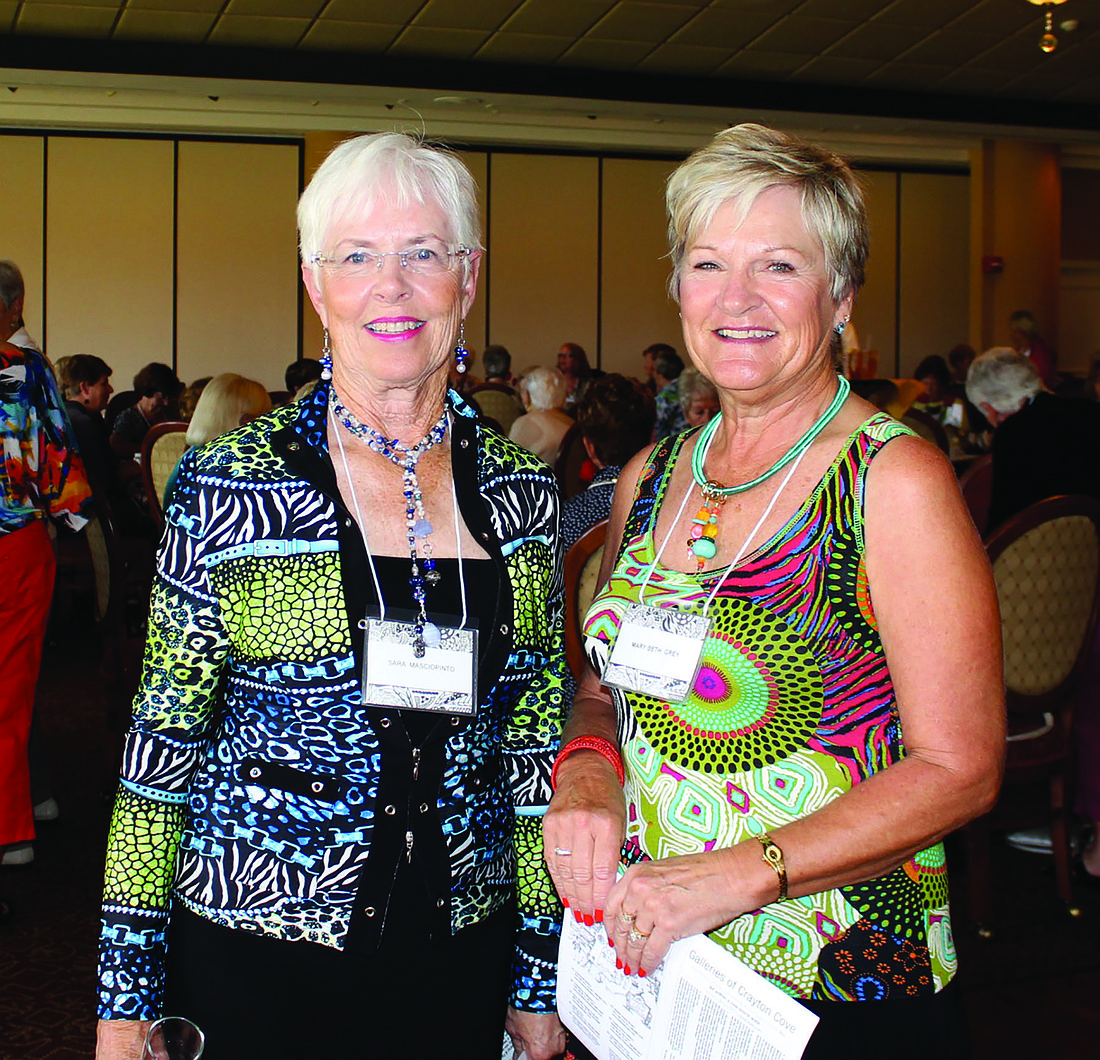 Photo by Nan Miller. Art Association of Palm-Aire co-presidents Sara Masciopinto and Mary Beth Grey enjoy the luncheon.