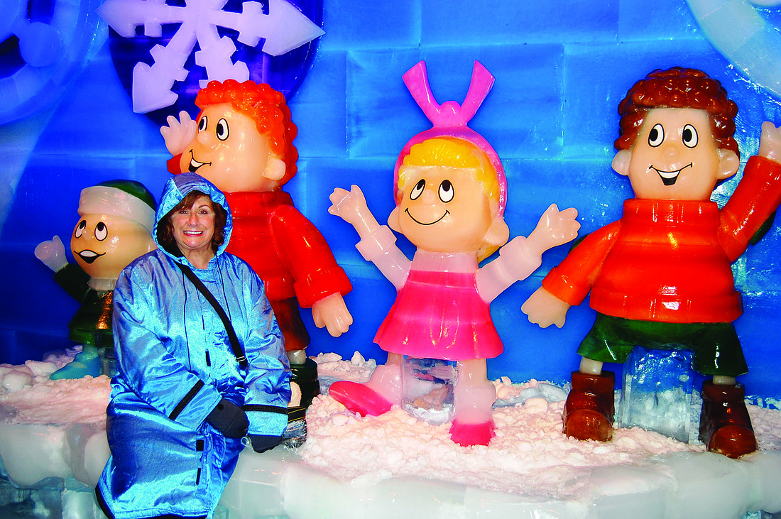 Courtesy photo. Diane Shaw, Lakewood Ranch WomenÃ¢â‚¬â„¢s Club program chairwoman, poses with ice sculptures.