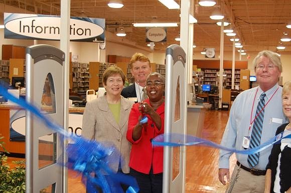 Sarasota County commissioners cut the ribbon at the Gulf Gate Library's temporary location in February.