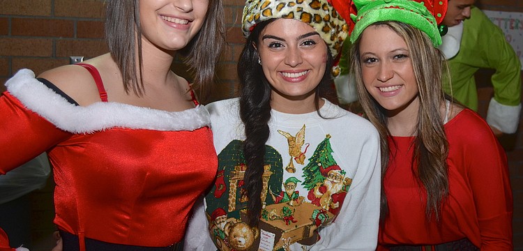Rachel Katzen, Michelle Kadorette and Gianna Traylor, 17, show off festive carnival ensembles.