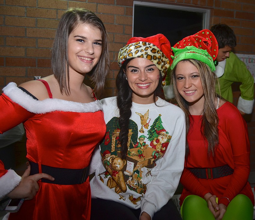 Rachel Katzen, Michelle Kadorette and Gianna Traylor, 17, show off festive carnival ensembles.