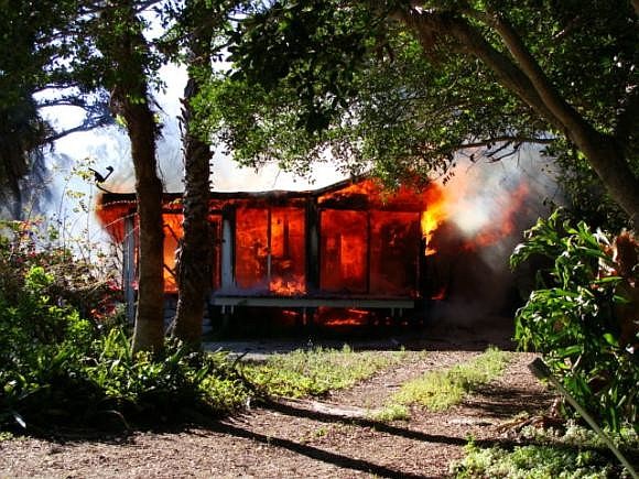 Flames engulfed the home in the 700 block of Lands End Drive this morning. (Longboat Key Fire Rescue)