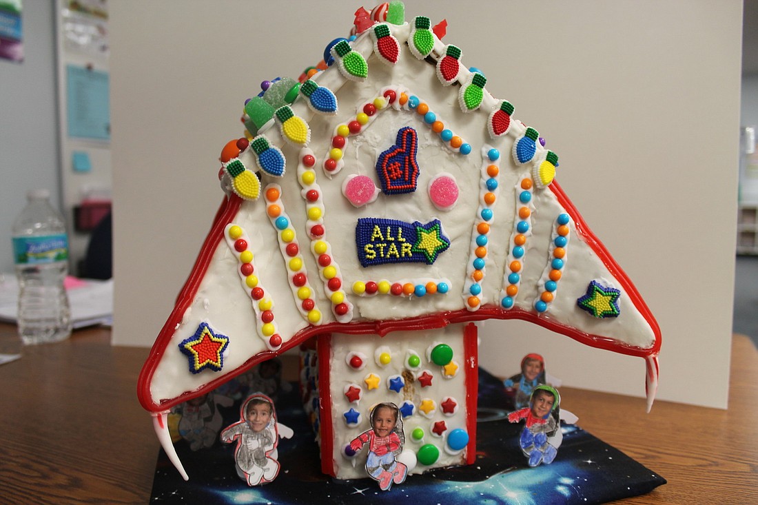 Aultman and her class of 18, along with the help of volunteer Susan Garrett, built a galactic-themed gingerbread house.