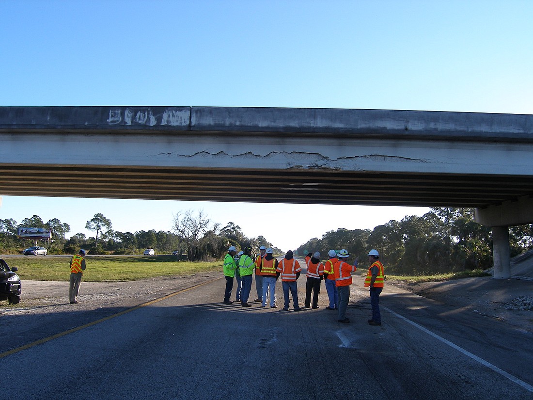 Engineers from the Florida Department of Transportation are evaluating damage to the overpass.