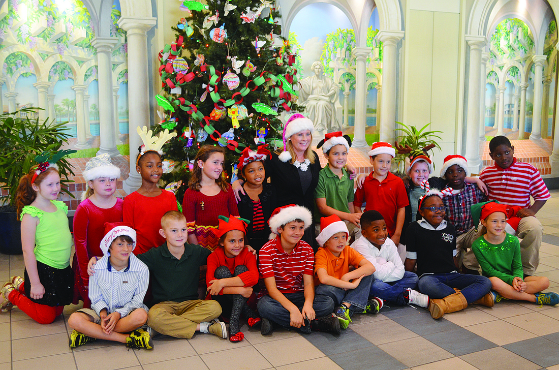 Melissa Owens' third-grade class dressed in holiday outfits.