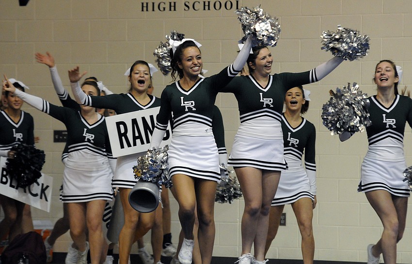 Co-captain Marina Masterson led the Lakewood Ranch varsity cheerleading squad out onto the floor.