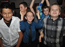 (Front) Nicholas Colacci, Dylan Bennett and Cade Saalmann felt the music.