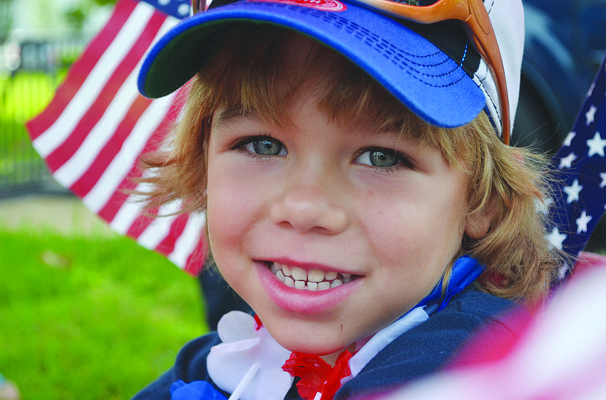 Finn Fluker, 4, rides in a wagon in the annual Longboat Key Freedom Fest parade July 4 at Bicentennial Park.