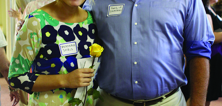 Longboat Key native Savannah Schield, with her dad, Steve, is one of 18 students who received scholarships from Longboat Island Chapel May 12.