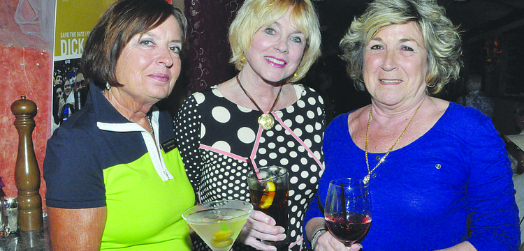 Jan Haynes, Nancy Vercauteren and Judy Heath raise their glasses April 3, at Restaurant Le Colonne, at a gathering of the Armalido Martini Club.
