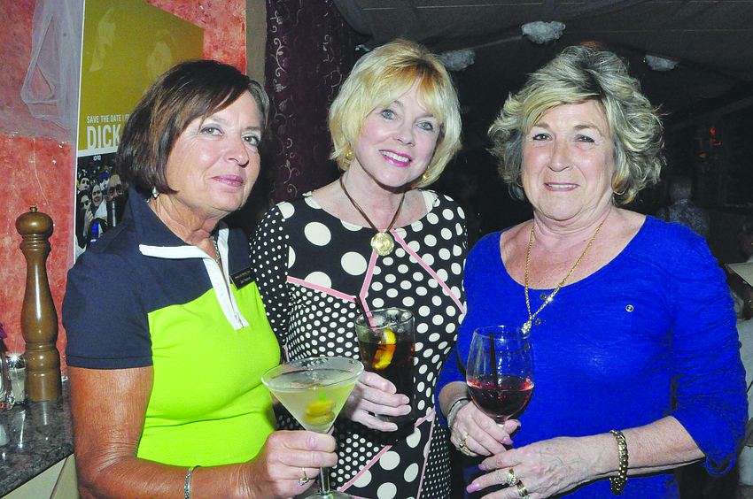 Jan Haynes, Nancy Vercauteren and Judy Heath raise their glasses April 3, at Restaurant Le Colonne, at a gathering of the Armalido Martini Club.