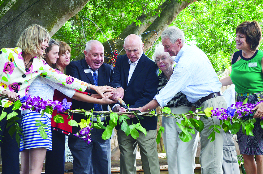 Marie Selby Botanical Gardens officials and Sarasota leaders cut the ribbon at the grand opening of the Ann Goldstein Children's Rainforest Garden Nov. 9