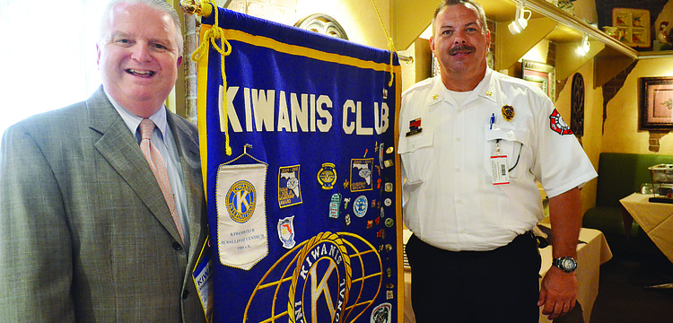 Siesta Key Kiwanis Club President Joe Sikora and Sarasota County Fire Department Chief Kevin Easton attend the Siesta Key Kiwanis Club weekly meeting Sept. 4.