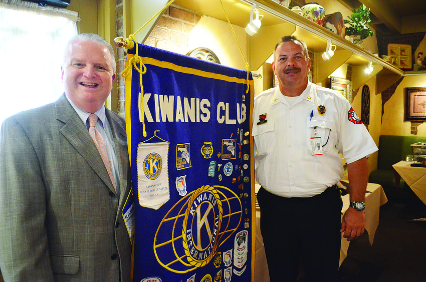 Siesta Key Kiwanis Club President Joe Sikora and Sarasota County Fire Department Chief Kevin Easton attend the Siesta Key Kiwanis Club weekly meeting Sept. 4.